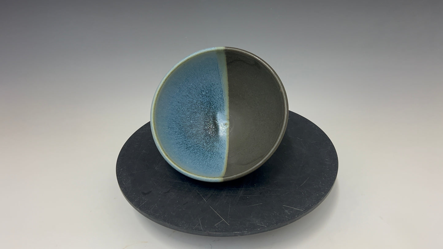 Small black and blue bowl.